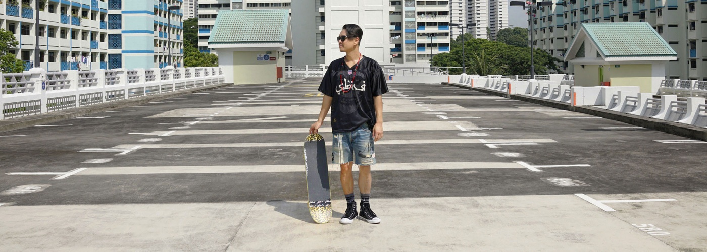 Mark Ong with a skateboard