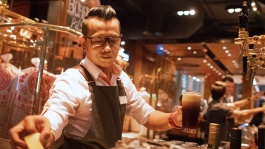 Bartender serving beer