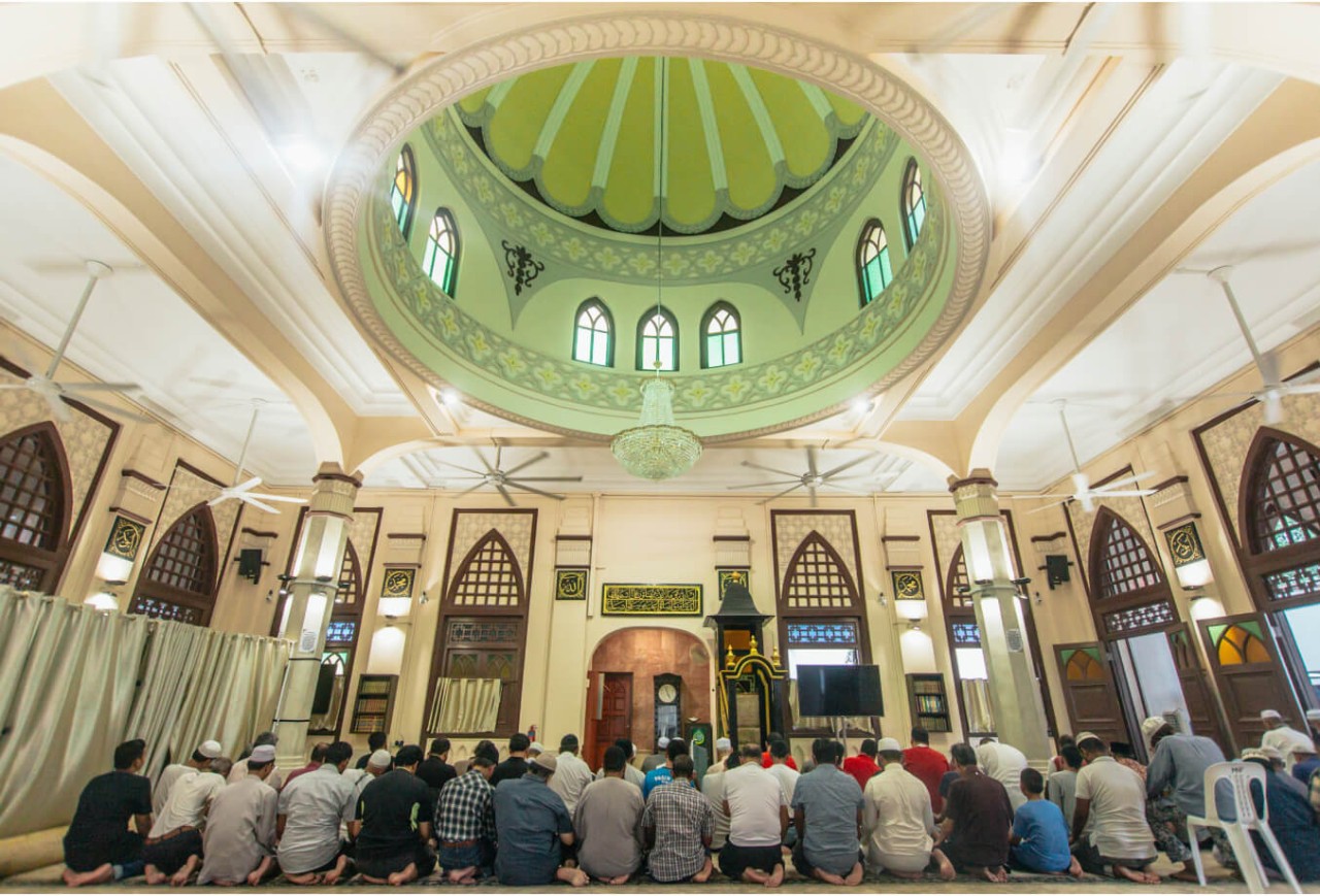 People offering prayers in Masjid Hajjah Fatimah