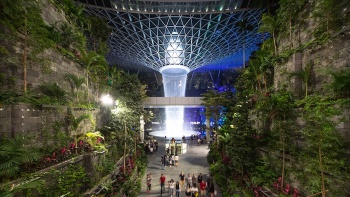 Evening view of the Shiseido Forest Valley and HSBC Rain Vortex at Jewel Changi