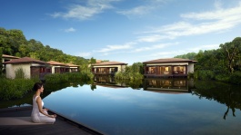 Người phụ nữ ngồi thiền trước hồ ngoài trời ở ESPA, Resorts World Sentosa