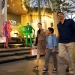 Family walking along ION Orchard with shopping bags